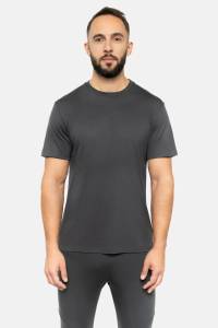 T-shirt męski z wełny merino na modelu, w kolorze khaki, widok z przodu